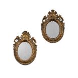 A PAIR OF SMALL ITALIAN CARVED GILTWOOD MIRRORS, POSSIBLY NEAPOLITAN, EARLY 18TH CENTURY