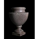 A LARGE PINK GRANITE URN, POSSIBLY FRENCH, 19TH CENTURY