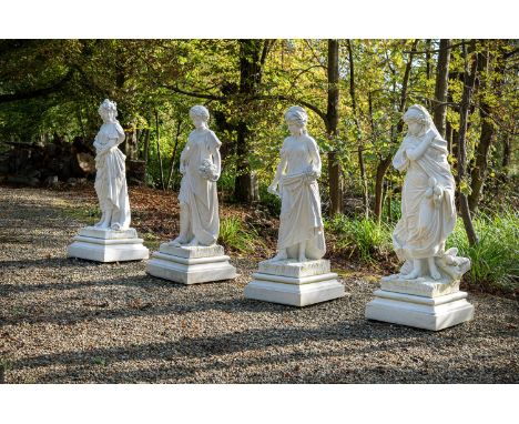 AFTER CARLO NICOLI, A SET OF FOUR MARBLE STATUES OF THE FOUR SEASONS  20TH CENTURY Winter wearing a cloak, Spring with flower