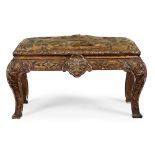 A GEORGE I GILTWOOD AND GESSO STOOL OR WINDOW SEAT, ATTRIBUTED TO JAMES MOORE, CIRCA 1720