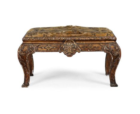 A GEORGE I GILTWOOD AND GESSO STOOL OR WINDOW SEAT ATTRIBUTED TO JAMES MOORE, CIRCA 1720 With an early 18th century upholster