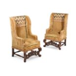 A PAIR OF CARVED WALNUT WING ARMCHAIRS, CIRCA 1700 AND LATER