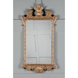 A GEORGE I GILTWOOD MIRROR, CIRCA 1725