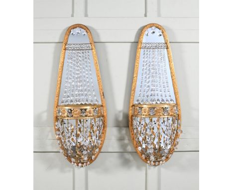 A LARGE PAIR OF ORMOLU AND CUT GLASS WALL LIGHTS  FRENCH OR RUSSIAN, LATE 19TH OR EARLY 20TH CENTURY  Of oval panel form, wit