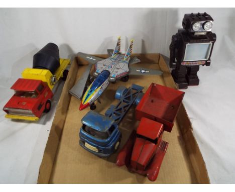 A good mixed lot to include a diecast Tri-ang truck, a Tri-ang trailer, a vintage robot and a Navy fighter plane with illumin