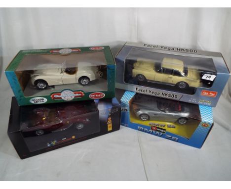 Four diecast 1:18 scale models comprising Burago BMW Z8, Britains Jaguar XK120, Facel Vega HK500 and Ferrari 1958 Testa Rossa