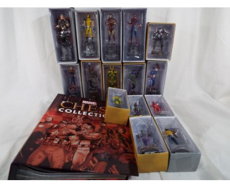 Marvel - fifteen Marvel chess figures manufactured by Eaglemoss to include Spider-Man, Iron Man, Wolverine, Loki, Dare Devil,