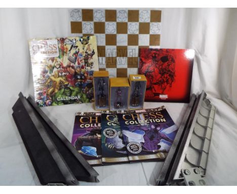 Marvel - three Marvel chess figures manufactured by Eaglemoss to include Jackal, Morlun and The Beetle, all with accompanying