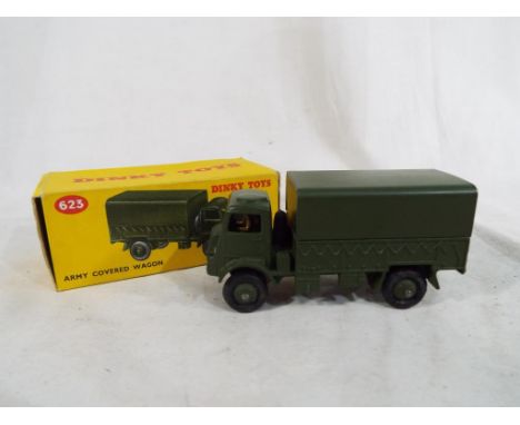 A Dinky 623 army covered wagon in repro box