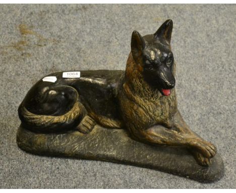 A composition model of a seated German Shepherd 