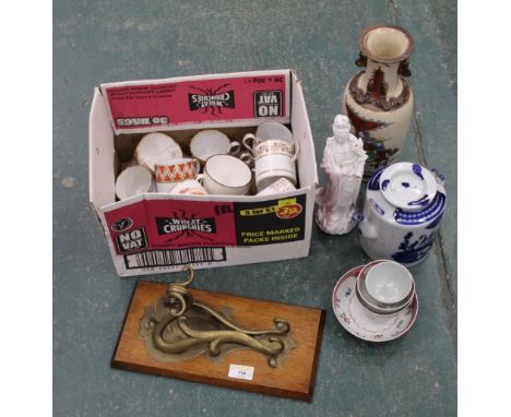 Solid brass Art Nouveau coat hook, two boxes of china, mixed cups and saucers, tea bowls, vase, etc 