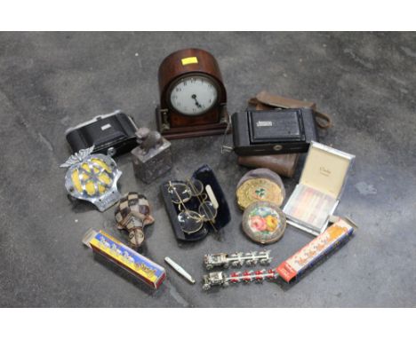 Vintage mantle clock, AA badge, box cameras, etc. 