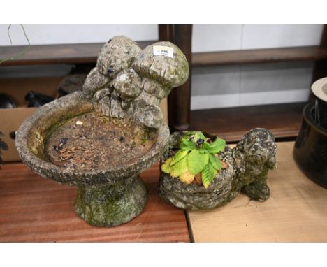 Mushroom garden birdbath and puppy planter with primrose