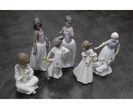 Six Nao figurines 