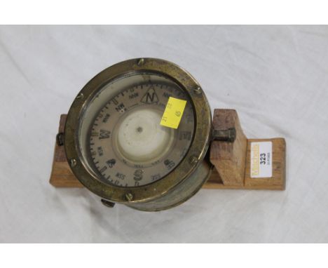 Floating brass compass on gimbal  