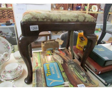 An 18th century Georgian pad foot stool with tapestry seat.