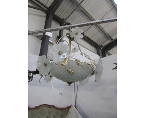 An old glass and metal ceiling light