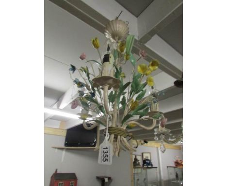 A coloured metal floral ceiling light.