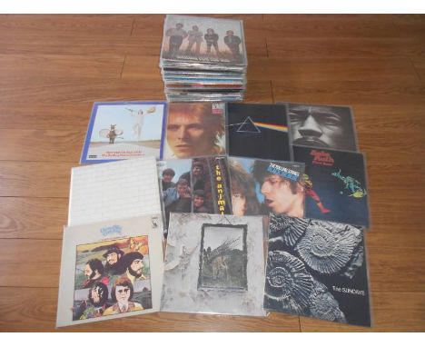 A Box (Appox 60) of Progressive and Classic Rock LP’s records Bob Dylan, , Rolling Stones,The Sundays, Pink Floyd, Babe Ruth,