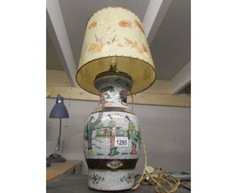 An oriental table lamp with shade
