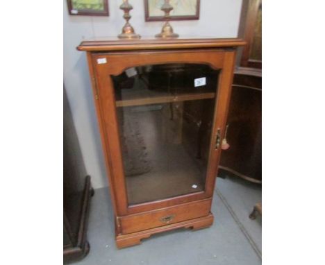 A mahogany music cabinet