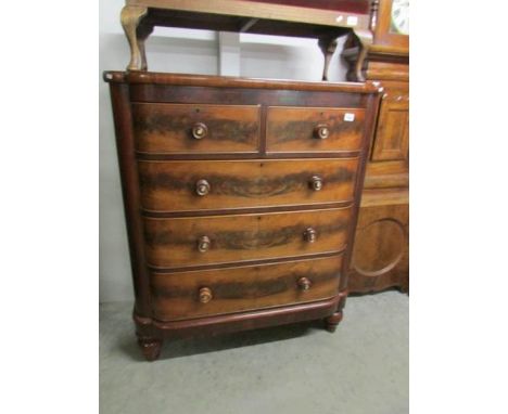 A Victorian mahogany 2 over 3 chest of drawers with mother of pearl inlaid handles.