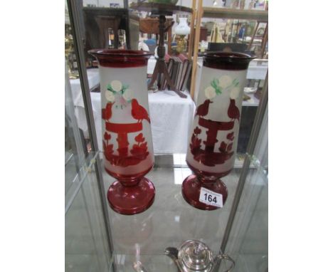 A pair of ruby glass vases