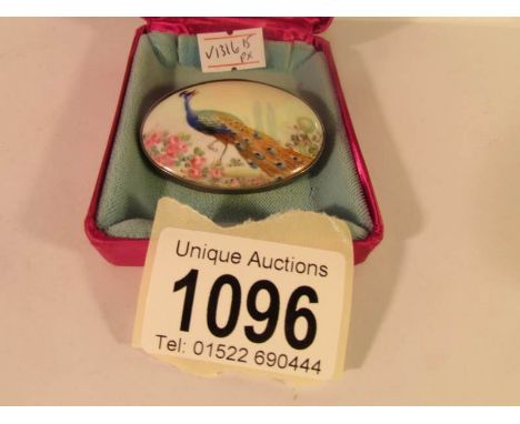 An enamel brooch by Royal Worcester painter Gresley, circa 1930's