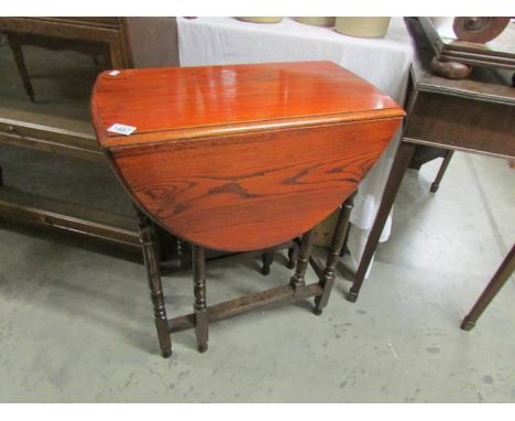 A small oak gate leg table.