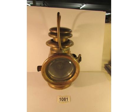 An Edwardian brass Howes & Burley H & B side lamp, circa 1910. off of a vintage car