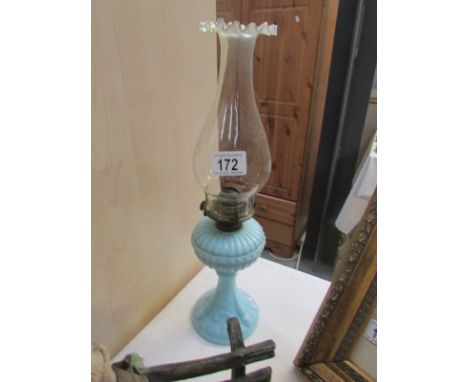 A glass oil lamp