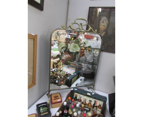 A brass fire screen inset hand painted mirror