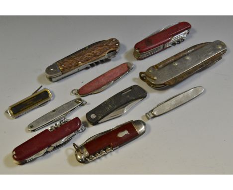 Pocket Knives - a foldable farrier's hoof tool; various steel examples; Swiss Army knives(9)