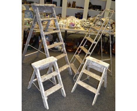 Industrial Salvage - a pair of heavily painted decorator hop-ups; a pair of heavily painted step ladders, another metal (4)