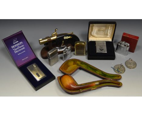 A 19th century pipe, silver collar, cased; a Ronson lighter, another; novelty lighter in the form of a pistol, etc 