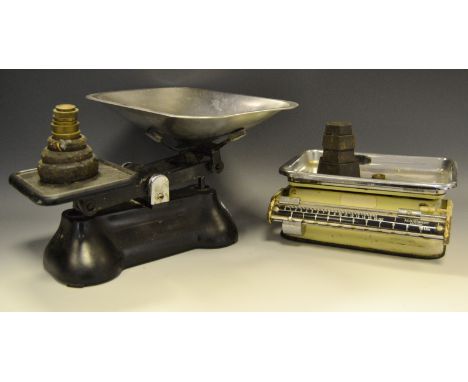 A kitchen top counter balance weighing scale and weights; another (2)