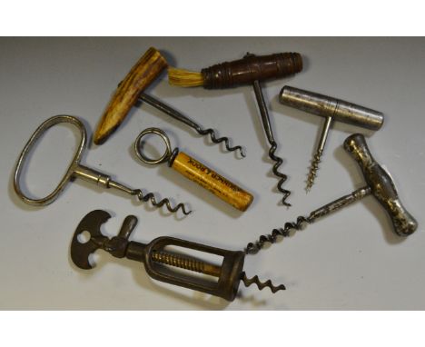 A George III treen and steel corkscrew with bristle brush; a Victorian polished steel corkscrew and interchangeable multi-too