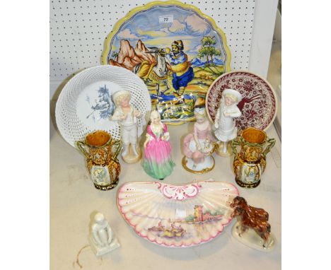 Decorative ceramics - an Italian decorative charger depicting a man and his mule; a pair of majolica twin handled tulip shape