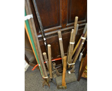 Garden tools including hand sickles; sledge hammer; a large mel; lawn edging shears; hoes; bow saw etc.