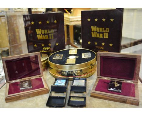 Militaria - Zippos - a complete Zippo WWII 'A Remembrance' volumes I and II; a Zippo D-Day Normandy lighter celebrating 50 ye