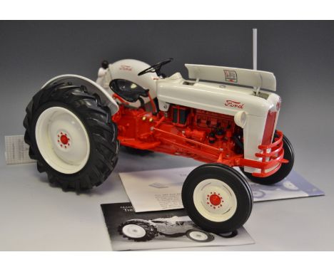 A 1953 Ford Jubilee Tractor by Franklin Mint Precision Models, information sheet & certificate  