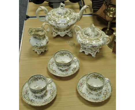 A Victorian Staffordshire part tea set, Teapot, sucrier and sugar bowl, three cups and saucers, each transfer printed and pai