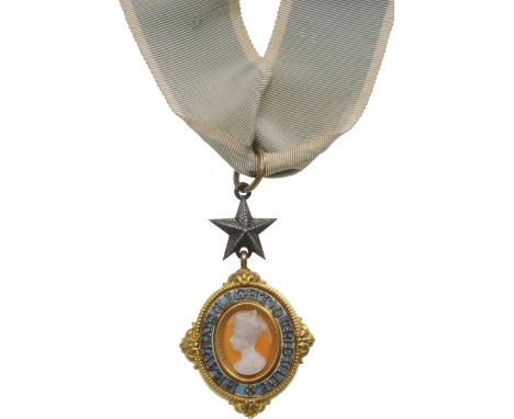 An Early Commanderâ€™s Badge of the Order in gold with centre medallion made as a cameo with the portrait of the young Queen 