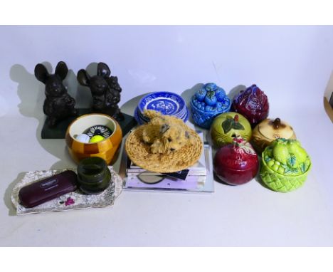 A mixed lot comprising ceramics to include kitchen jars, photograph frames, Pendelfin ornaments and other. [W]

NOTE: IN HOUS