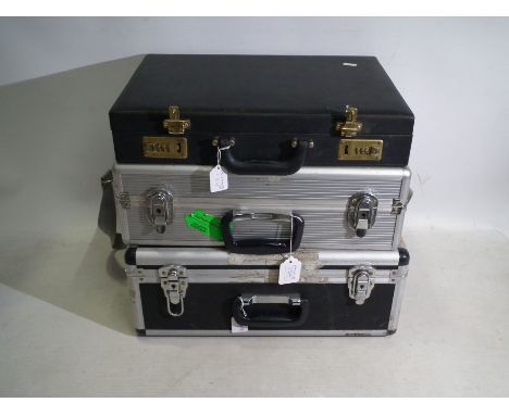 Two flight cases and a briefcase. [3]. [S]