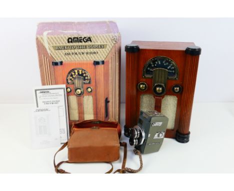 A boxed Omega Back To The Oldies vintage style radio and a Crown 8 E3B film camera. [W]