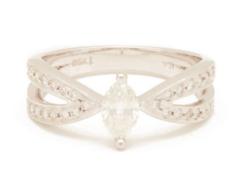 A MARQUISE CUT DIAMOND SOLITAIRE RING
Set in 18k white gold, the central marquise cut diamond in a claw setting, to diamond s