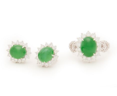 A JADE AND DIAMOND RING AND EARRINGS SET
Set in 18k white gold, of cluster design with oval jade cabochons and round brillian