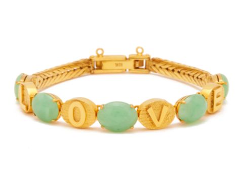 A GOLD AND JADE BRACELET
18k gold, set with alternating oval green jade cabochons and the letters LOVE
Marked 18K to the clas