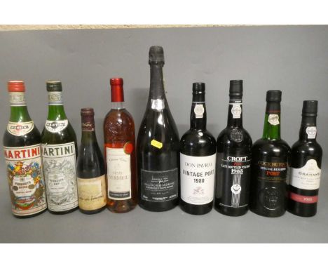 Nine bottles of port and other alcohol, including a Don Pavral 1980 vintage port, a Croft 1983 LBV, a Cockburns special reser